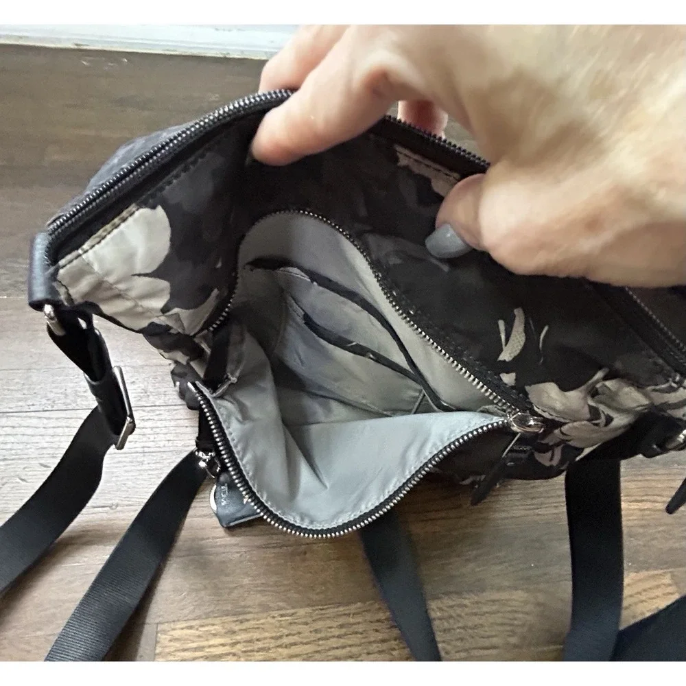 Womens Tumi Voyageur Canton crossbody African Floral Magnetic And Zip Closure